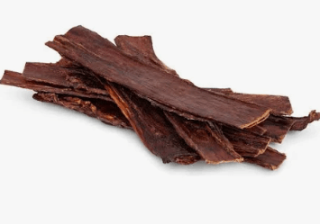 Eight dark brown, flat Beef Gullet Strips stacked in a pile on a white background.